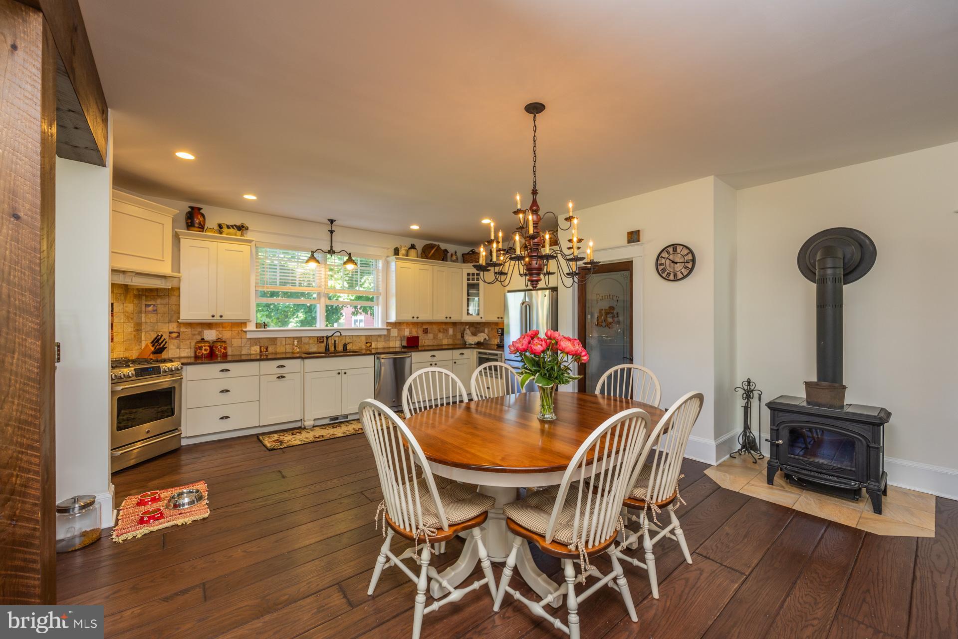 550 Hands Mill Road Woodbine, NJ 08270 - Photo 36 of 57 a view of a dining room with furniture and wooden floor