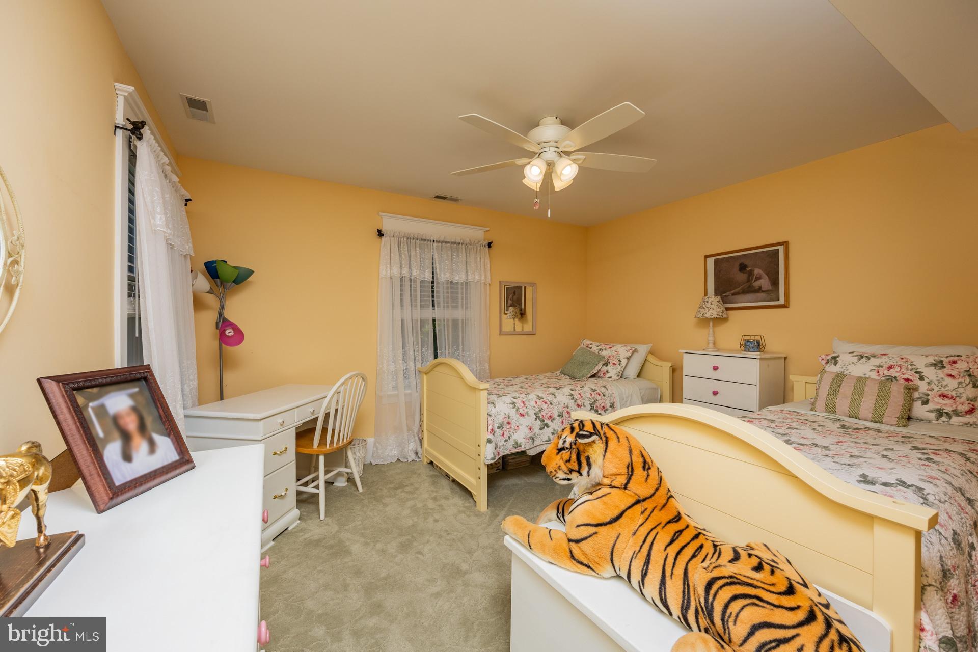 550 Hands Mill Road Woodbine, NJ 08270 - Photo 46 of 57 a bedroom with a bed and a chandelier