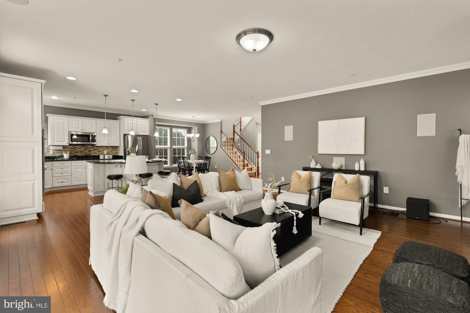 15611 Coolidge Avenue Silver Spring, MD 20906 - Photo 20 of 57 a living room with furniture kitchen view and a wooden floor
