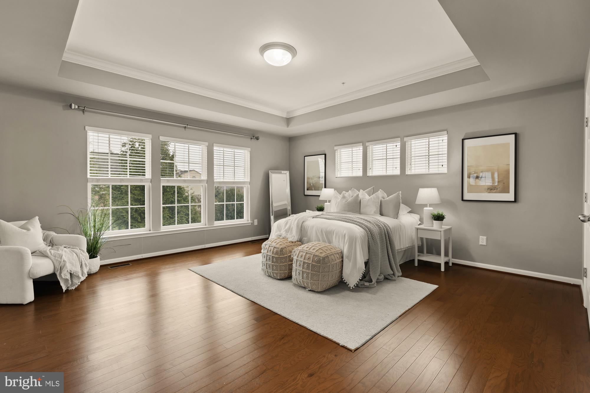 15611 Coolidge Avenue Silver Spring, MD 20906 - Photo 29 of 57 a bedroom with a bed and wooden floor