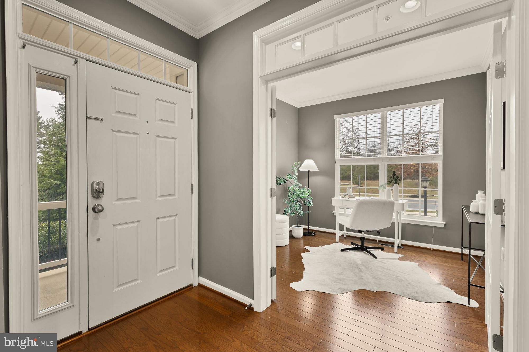 15611 Coolidge Avenue Silver Spring, MD 20906 - Photo 4 of 57 a view of a room with wooden floor and windows