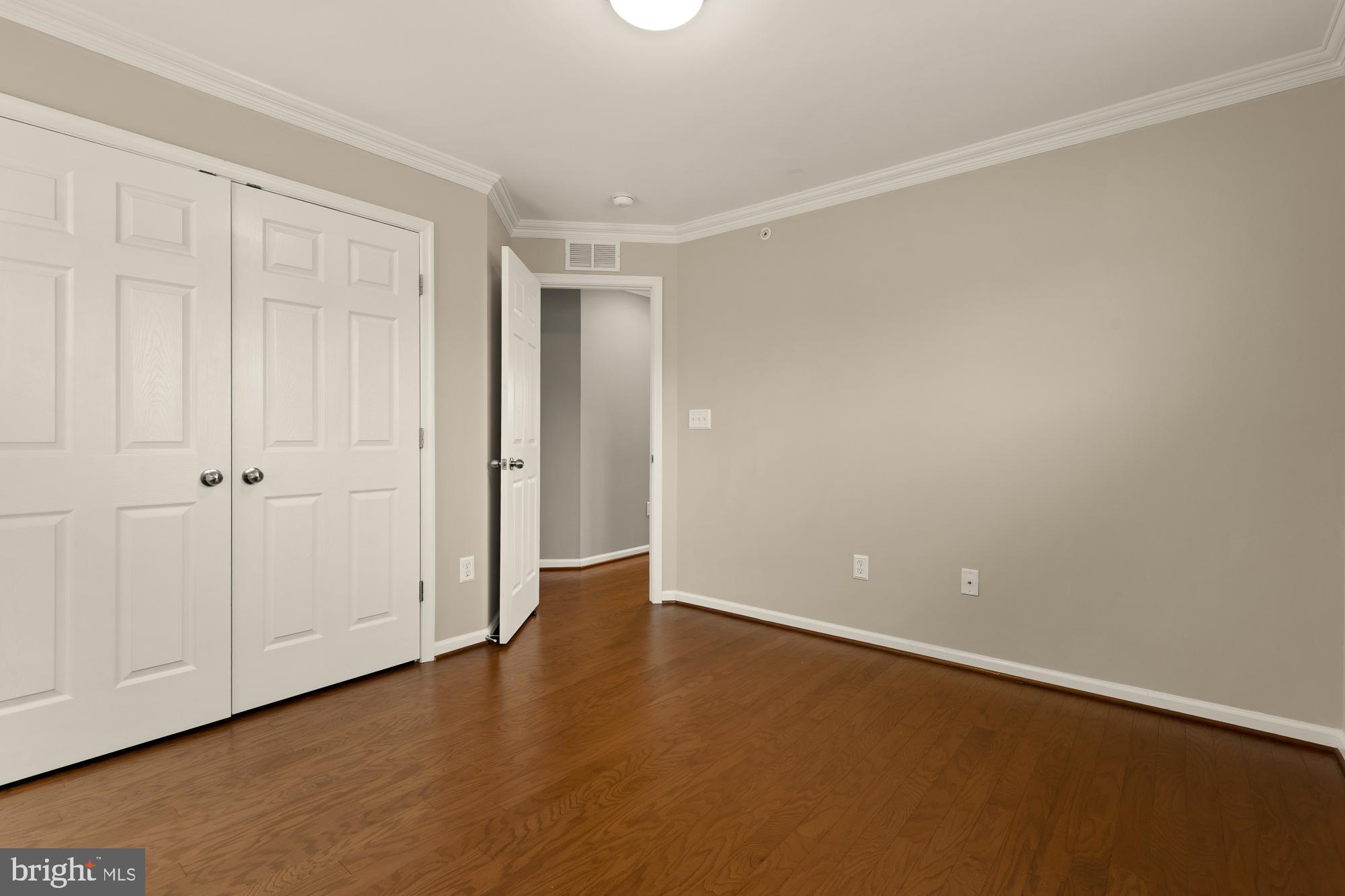15611 Coolidge Avenue Silver Spring, MD 20906 - Photo 42 of 57 a view of an empty room with wooden floor