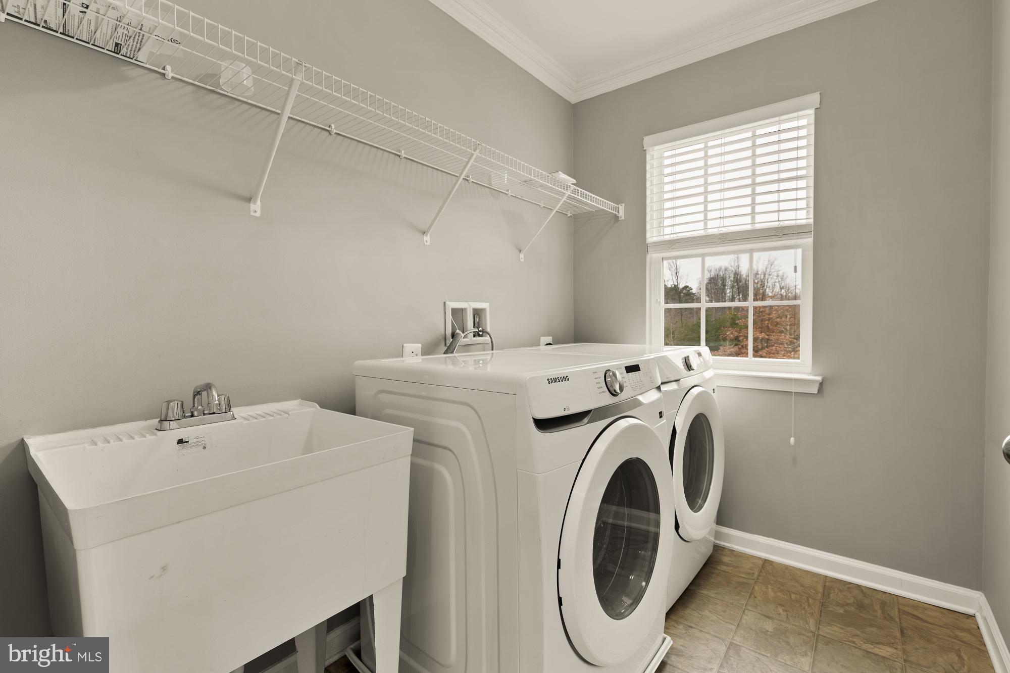 15611 Coolidge Avenue Silver Spring, MD 20906 - Photo 44 of 57 a utility room with dryer and washer