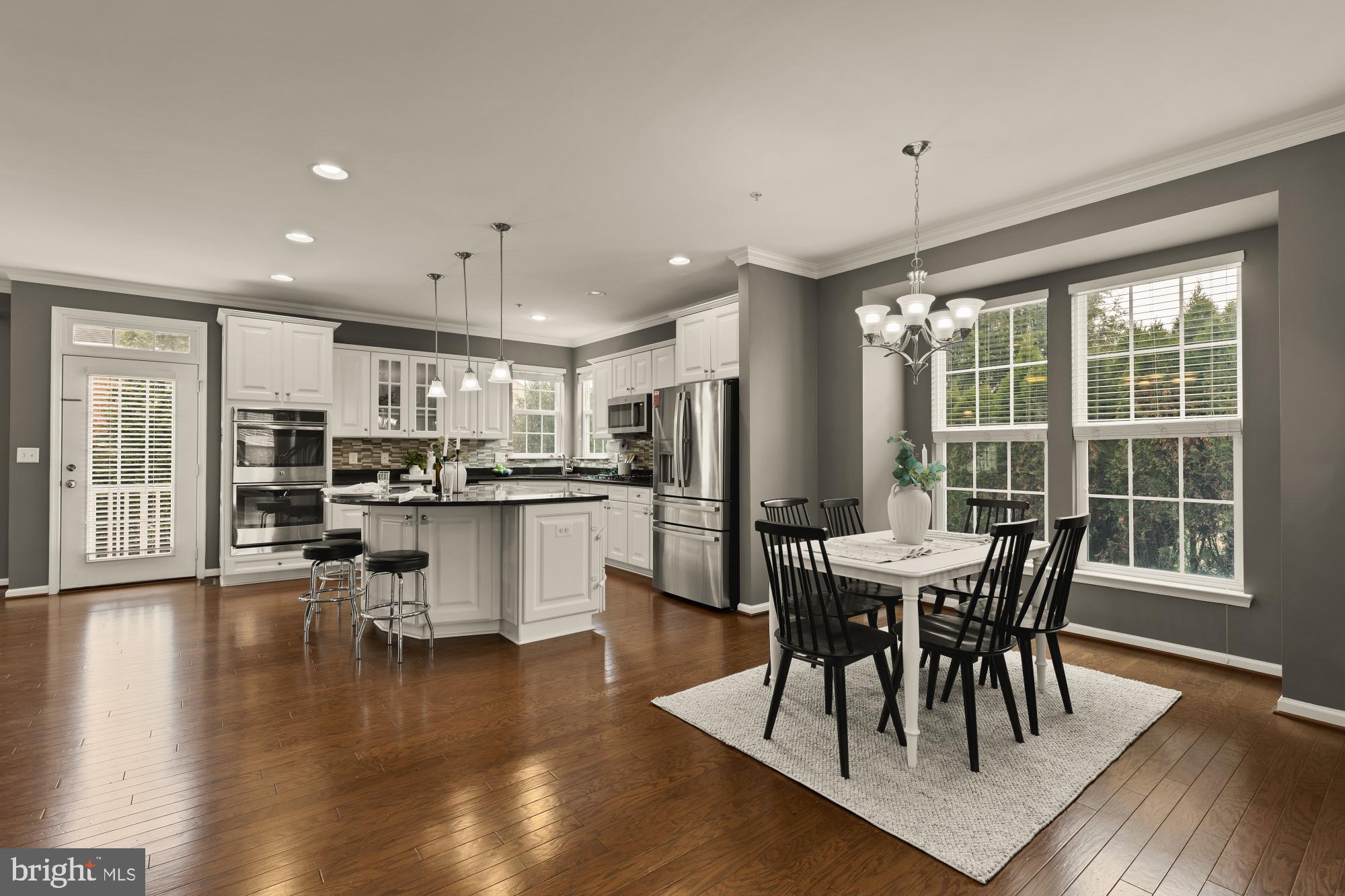 15611 Coolidge Avenue Silver Spring, MD 20906 - Photo 8 of 57 a view of a dining room with furniture window and wooden floor