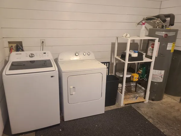 a utility room with dryer and washer