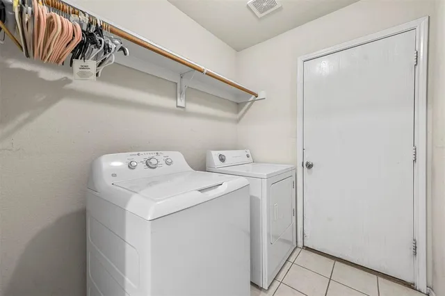 a backyard of a house with outdoor seating