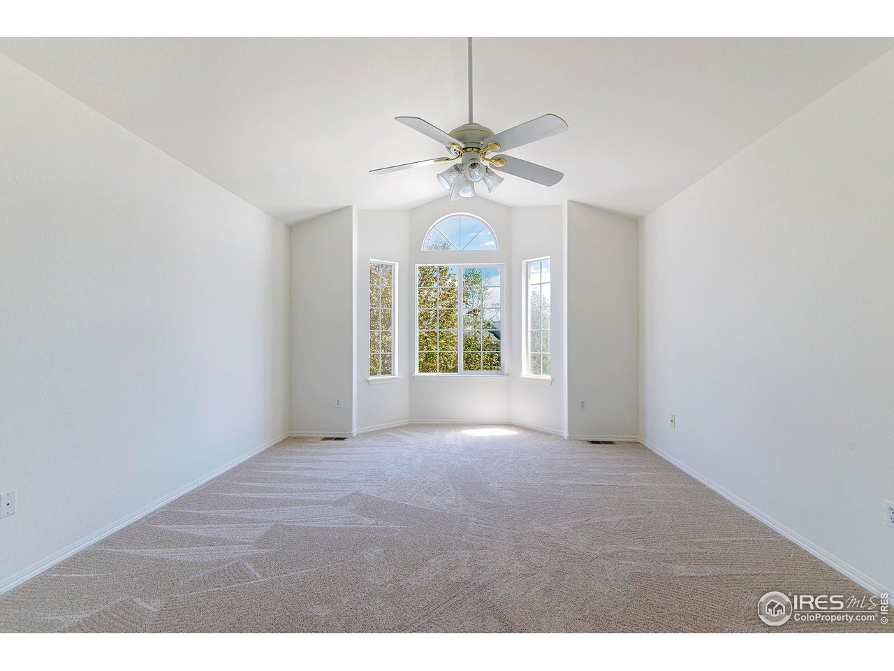1414 Hoffman Drive Erie, CO 80516 - Photo 26 of 37 a view of an empty room with a window
