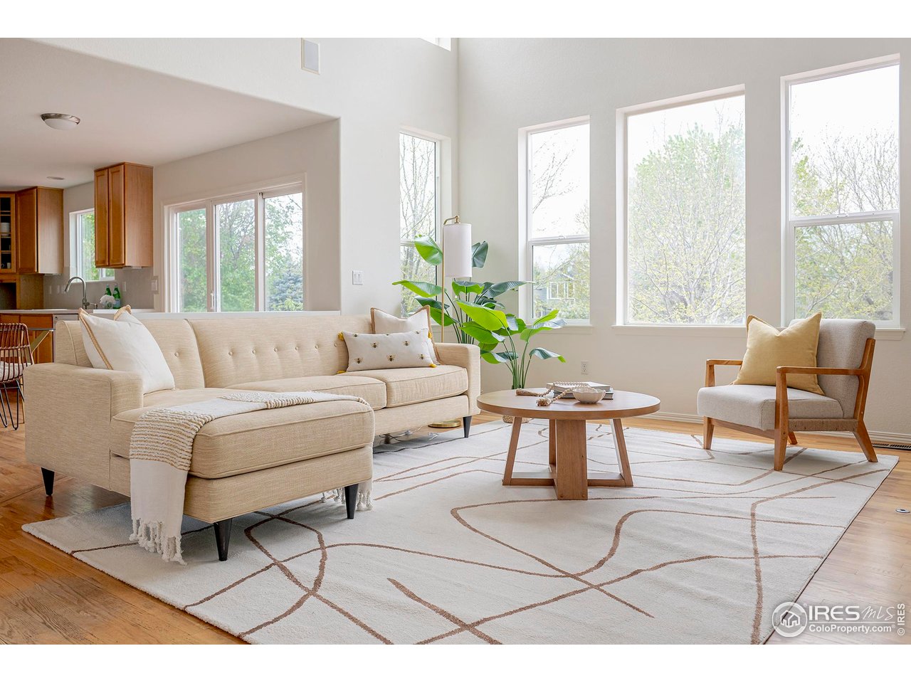 1414 Hoffman Drive Erie, CO 80516 - Photo 3 of 37 a living room with furniture and a large window