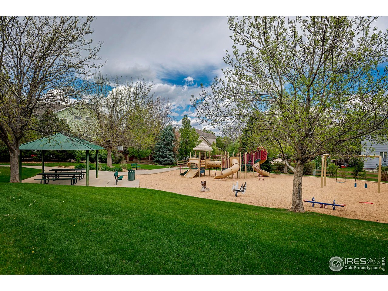1414 Hoffman Drive Erie, CO 80516 - Photo 36 of 37 a view of a backyard with sitting area