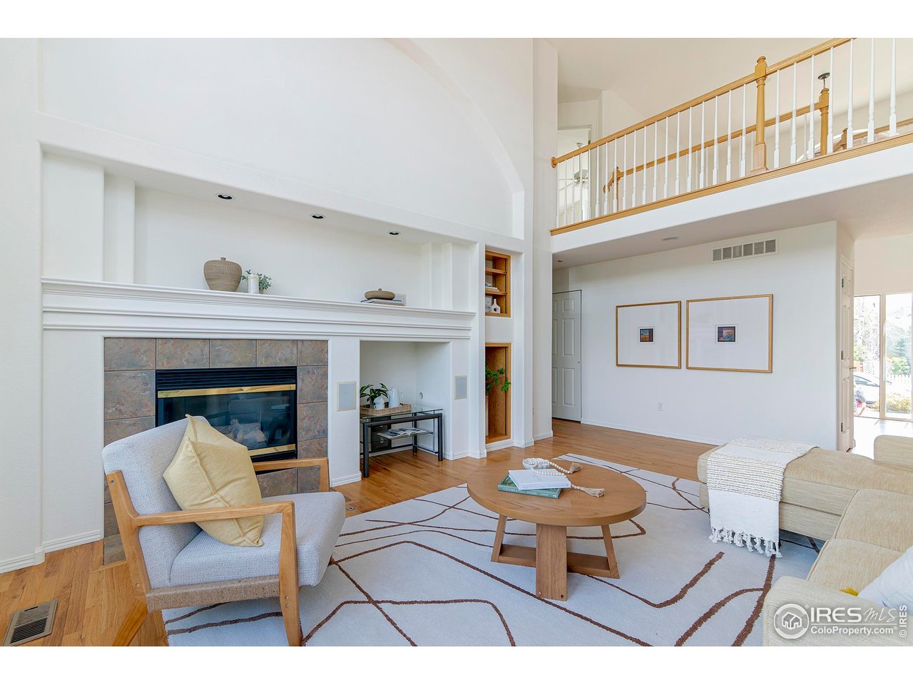 1414 Hoffman Drive Erie, CO 80516 - Photo 10 of 37 a living room with furniture and a fireplace