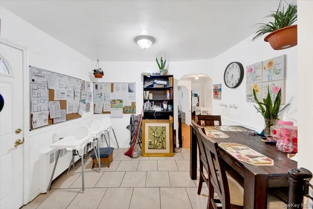 a view of a livingroom with furniture and lounge chair