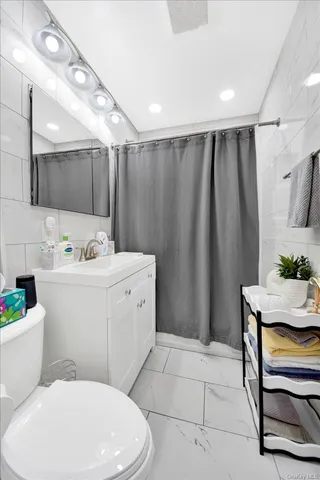 a open dining room with a table and chairs