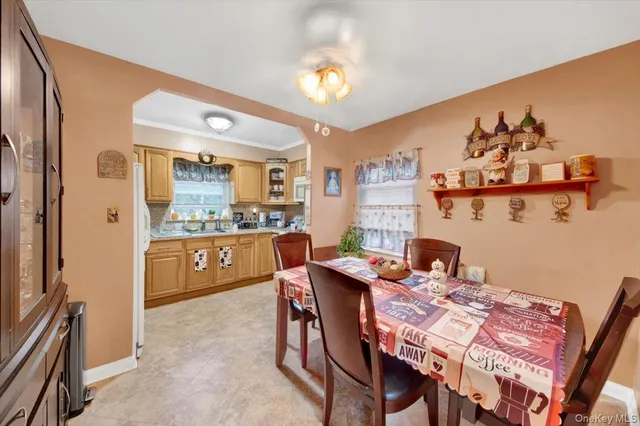 a picture of a room with a white wall and picture