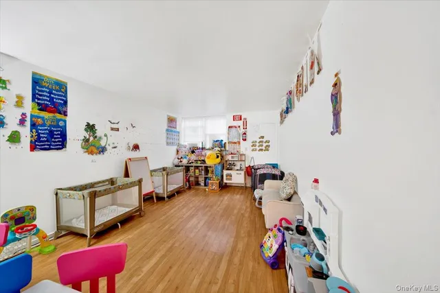 a bathroom with a sink a toilet and shower curtain