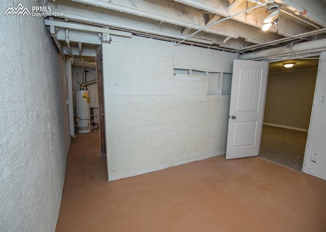 408 Placid Road Colorado Springs, CO 80910 - Photo 31 of 36 This room would make a great storage area.