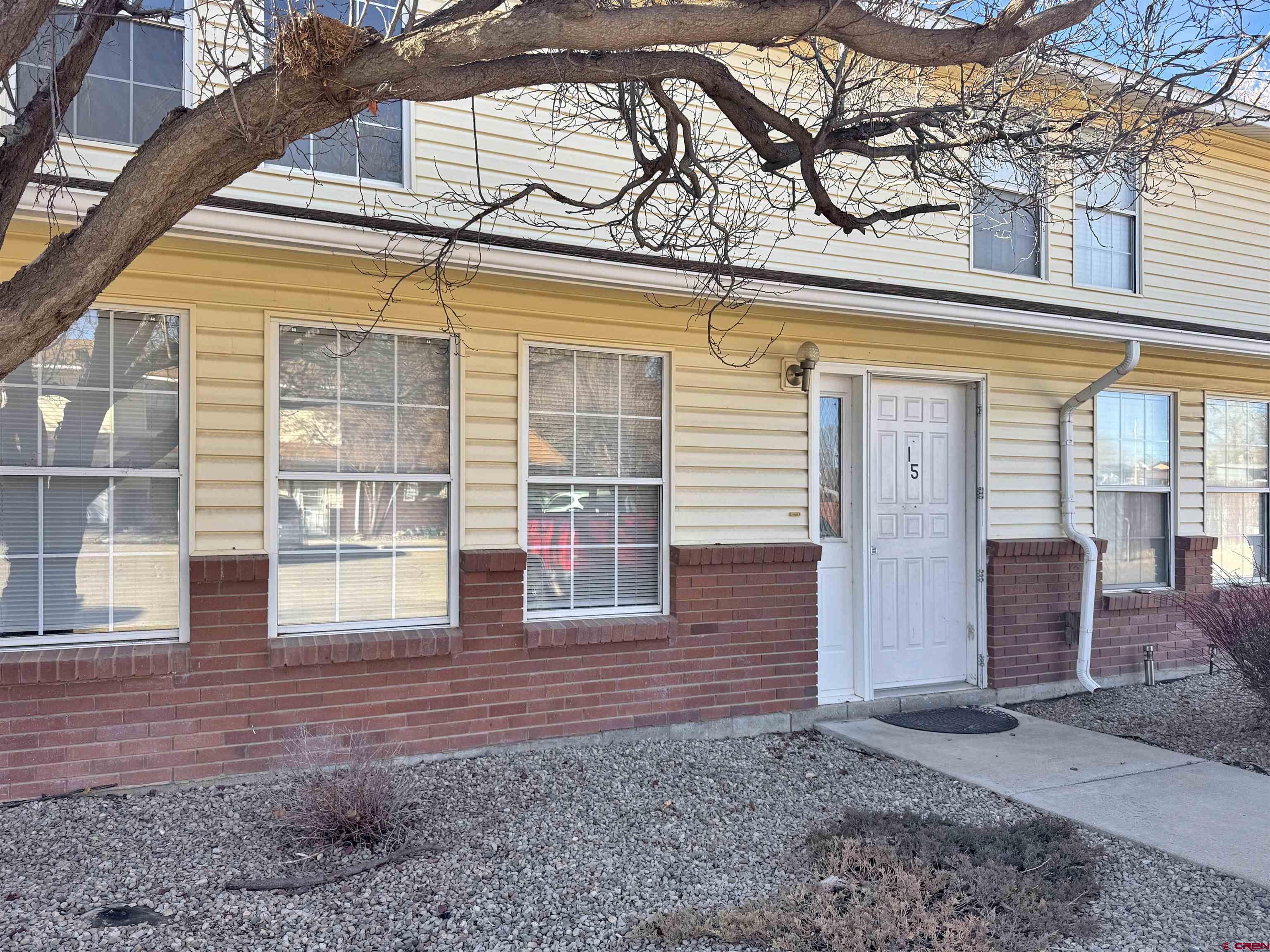520 West 6th Street, Unit 15 Cortez, CO 81321 - Photo 18 of 22 a view of a brick building with many windows