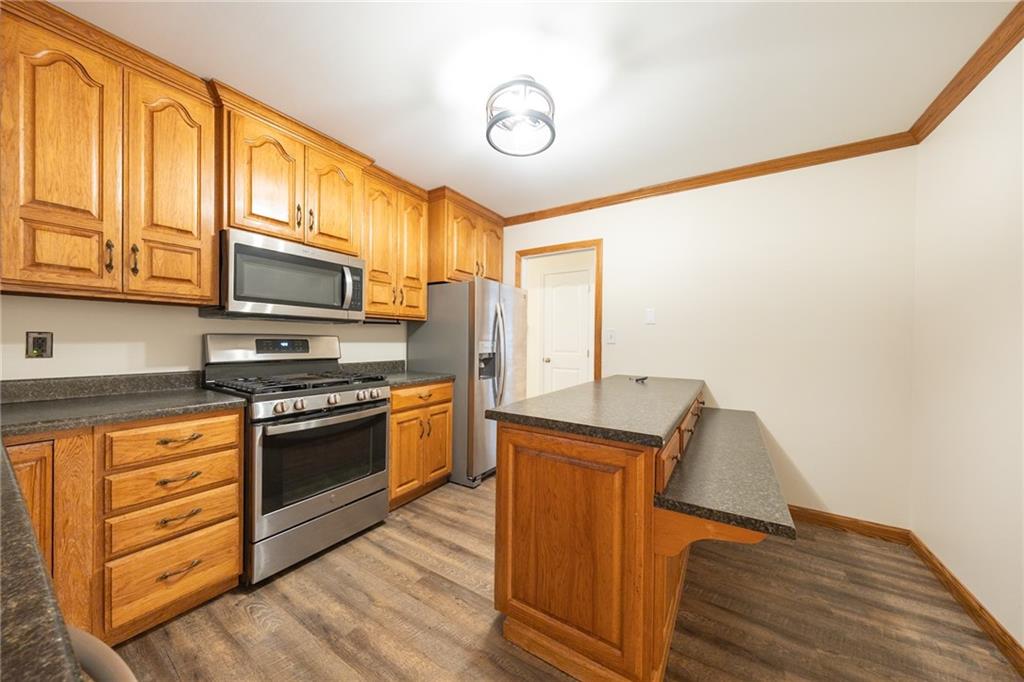 129 Green Brae Road Kittanning, PA 16201 - Photo 7 of 34 Kitchen with breakfast bar area that also provides extra storage and counter space
