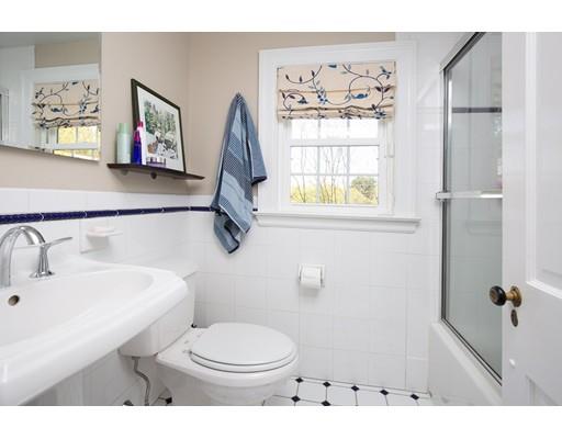 40 Pine Ridge Road Wellesley, MA 02481 - Photo 8 of 12 a bathroom with a sink a toilet and a window
