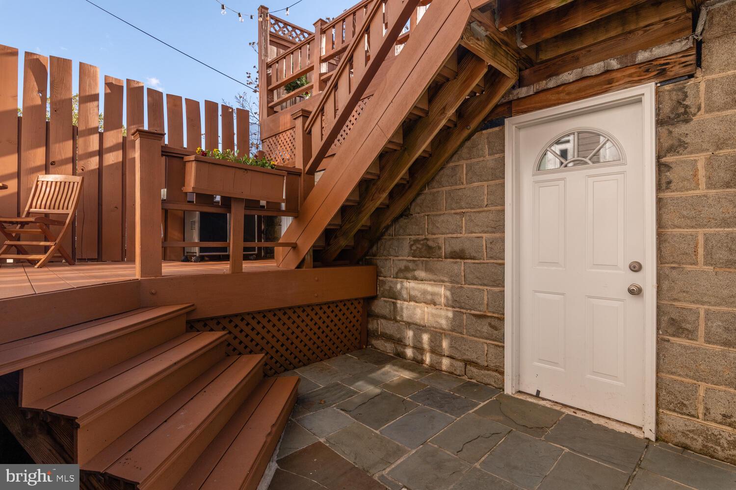 1352 Spring Road Northwest Washington, DC 20010 - Photo 13 of 14 a view of entryway with wooden floor and stairs