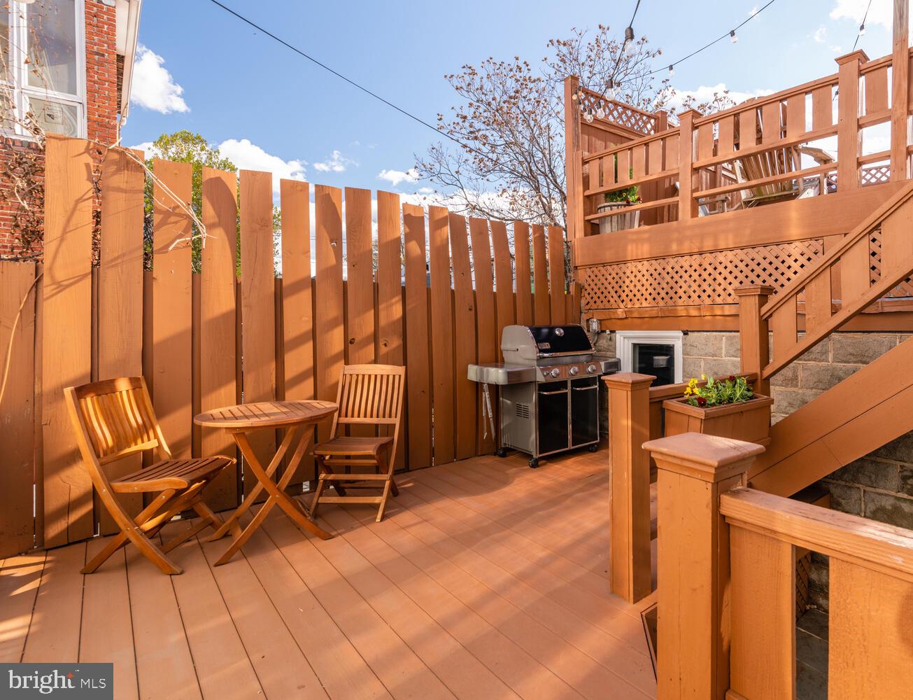 1352 Spring Road Northwest Washington, DC 20010 - Photo 4 of 14 a view of a patio with table and chairs