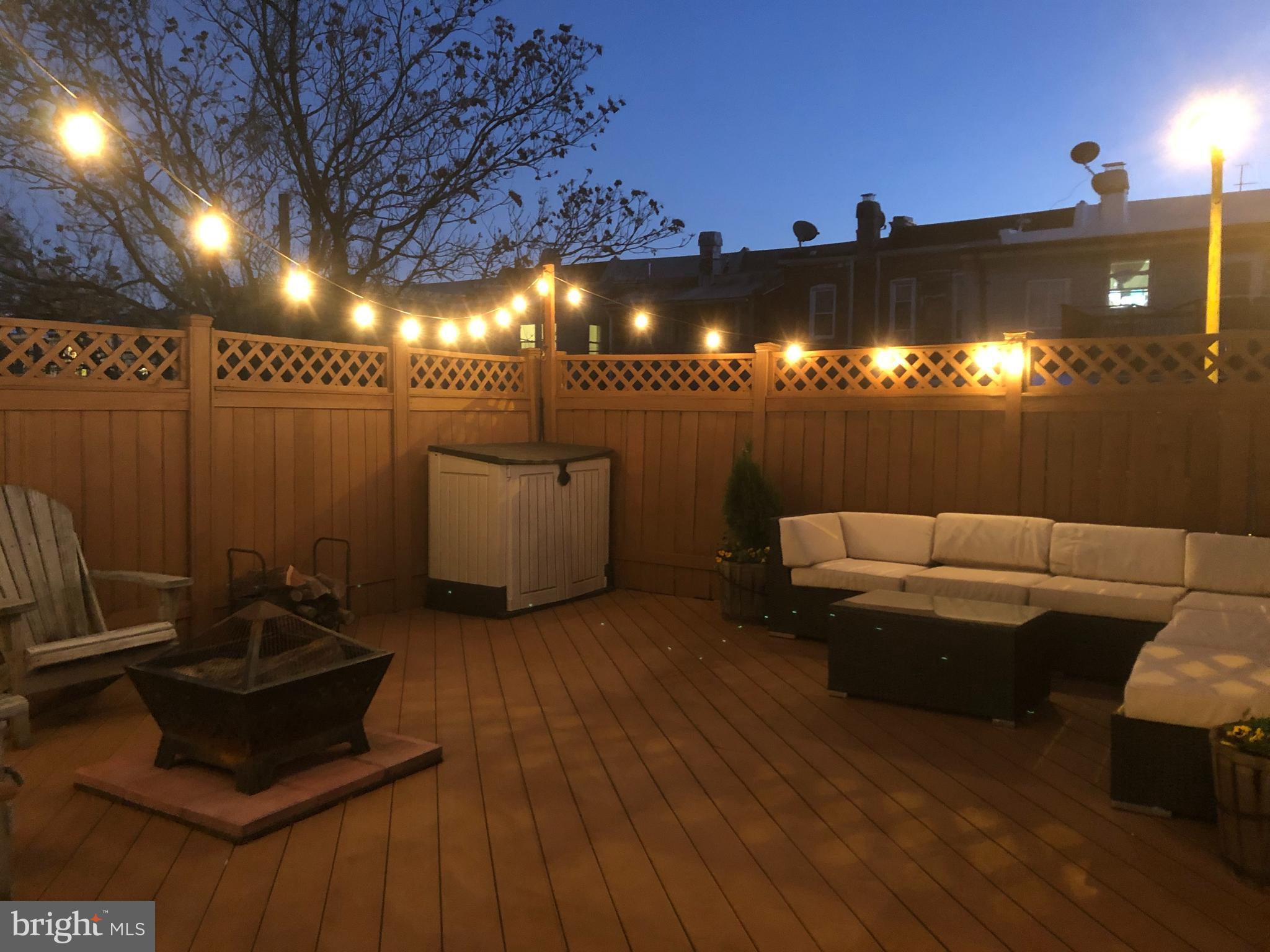 1352 Spring Road Northwest Washington, DC 20010 - Photo 10 of 14 a living room with furniture and a floor to ceiling window