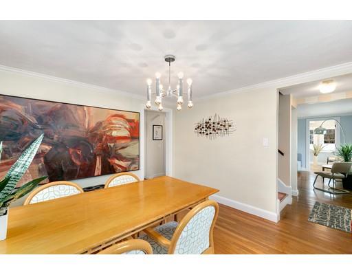 78 Cumberland Road Newton, MA 02465 - Photo 12 of 30 a view of a livingroom with furniture a chandelier and wooden floor
