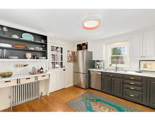 78 Cumberland Road Newton, MA 02465 - Photo 13 of 30 a kitchen with a sink a refrigerator and cabinets
