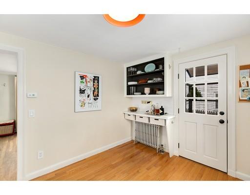 78 Cumberland Road Newton, MA 02465 - Photo 16 of 30 a kitchen with cabinets and a flat screen tv