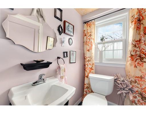 78 Cumberland Road Newton, MA 02465 - Photo 17 of 30 a bathroom with a toilet sink and mirror