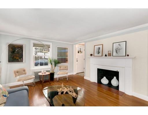 78 Cumberland Road Newton, MA 02465 - Photo 20 of 30 a living room with furniture and a fireplace