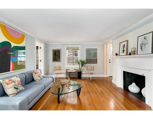78 Cumberland Road Newton, MA 02465 - Photo 25 of 30 a living room with furniture a fireplace and a large window