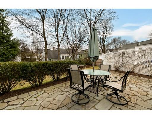 78 Cumberland Road Newton, MA 02465 - Photo 28 of 30 a view of a patio with table and chairs and potted plants