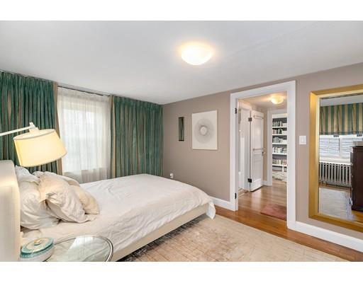 78 Cumberland Road Newton, MA 02465 - Photo 4 of 30 a bedroom with a bed and a mirror