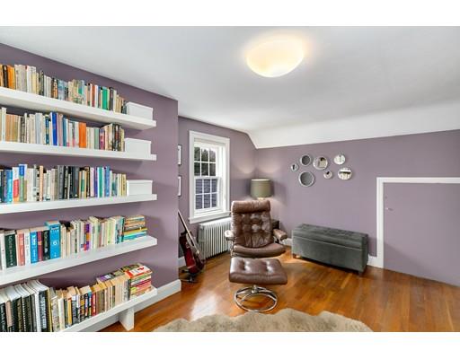 78 Cumberland Road Newton, MA 02465 - Photo 7 of 30 a living room with furniture and a book shelf