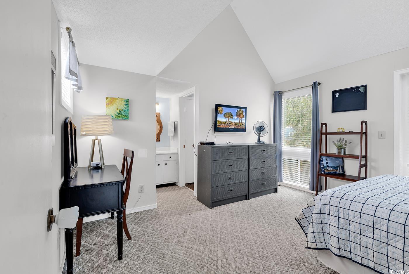 351 Lake Arrowhead Road, Unit 12347 Myrtle Beach, SC 29572 - Photo 15 of 36 Carpeted bedroom featuring vaulted ceiling, ensuit
