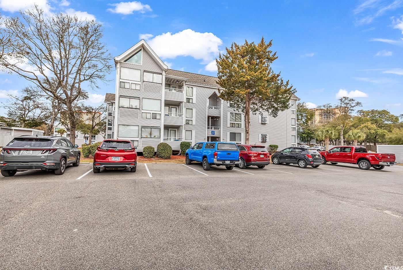 351 Lake Arrowhead Road, Unit 12347 Myrtle Beach, SC 29572 - Photo 2 of 36 View of building exterior with uncovered parking