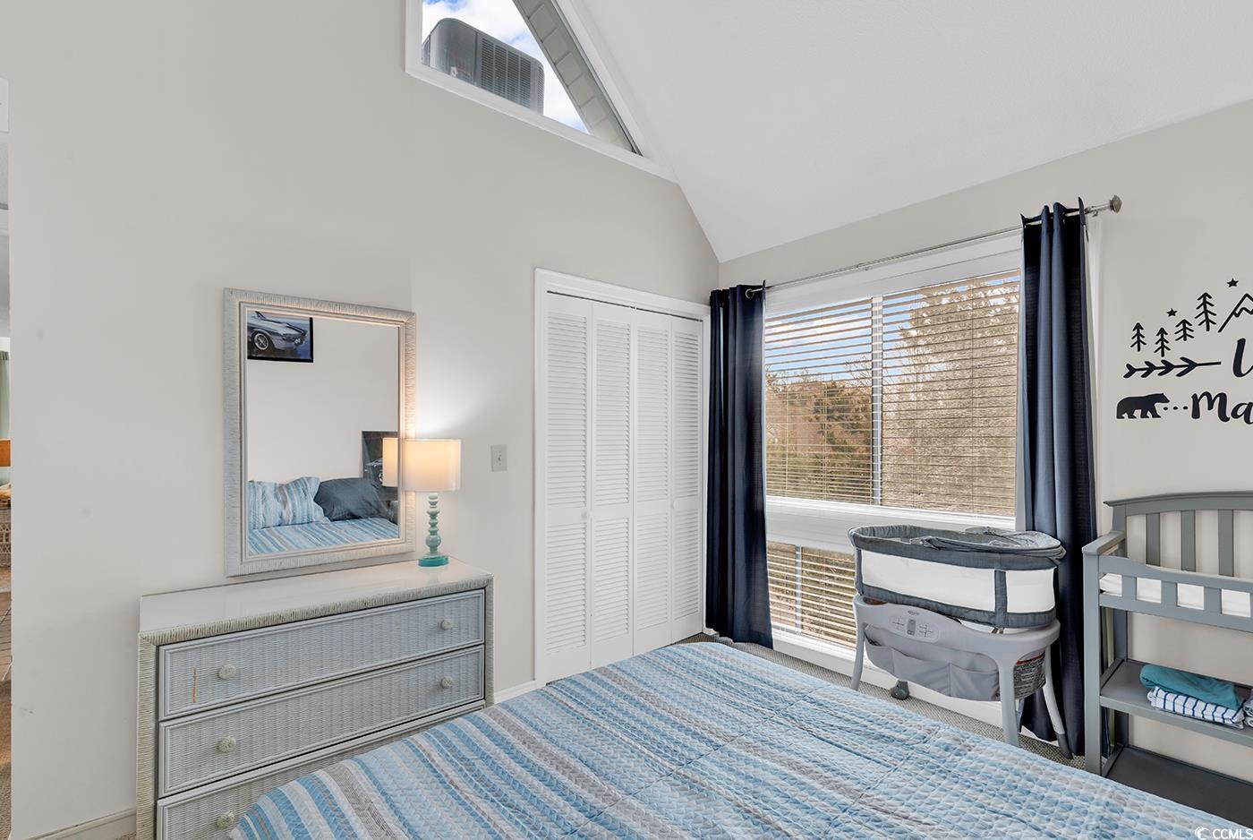 351 Lake Arrowhead Road, Unit 12347 Myrtle Beach, SC 29572 - Photo 24 of 36 Bedroom featuring lofted ceiling and a closet