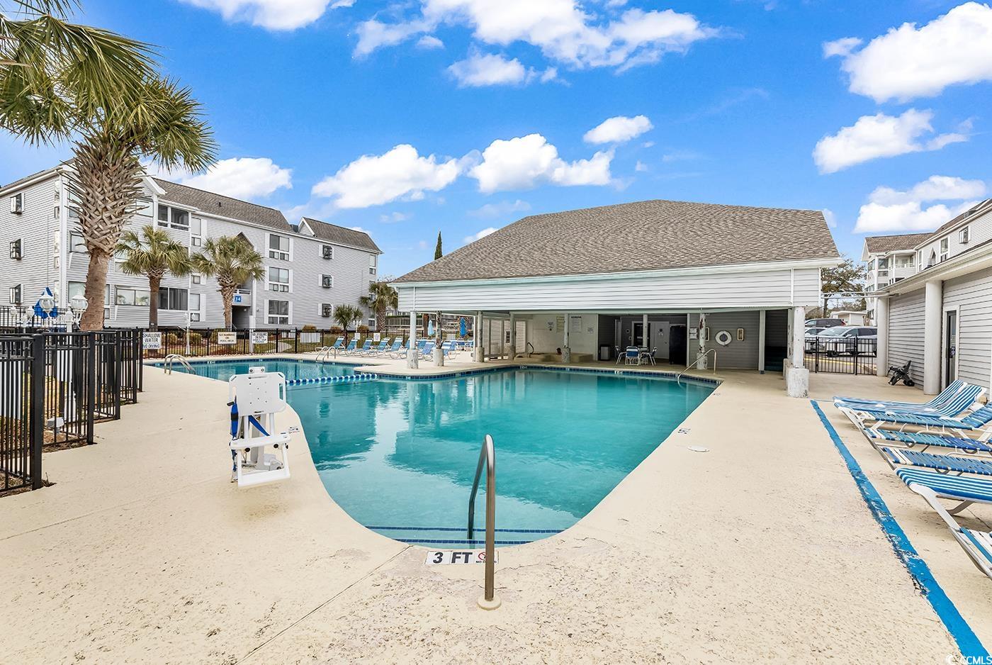 351 Lake Arrowhead Road, Unit 12347 Myrtle Beach, SC 29572 - Photo 29 of 36 Community pool featuring fence and a patio