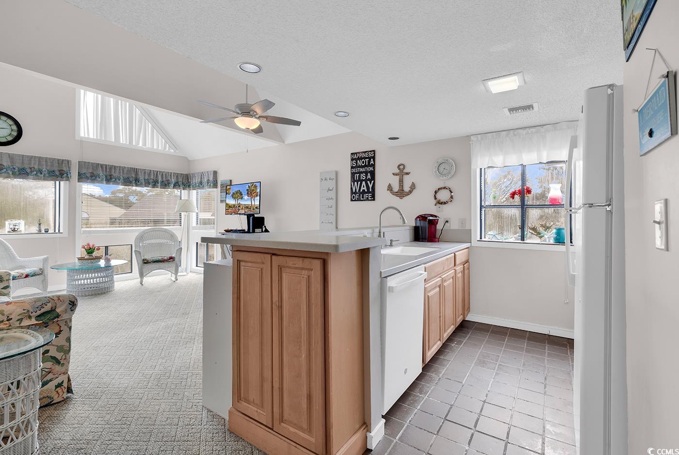 351 Lake Arrowhead Road, Unit 12347 Myrtle Beach, SC 29572 - Photo 3 of 36 Kitchen with lofted ceiling, light countertops, a
