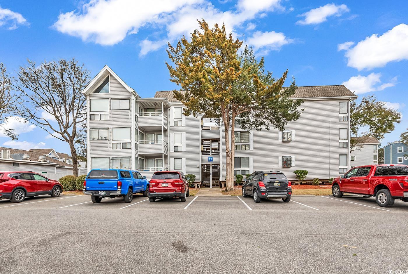 351 Lake Arrowhead Road, Unit 12347 Myrtle Beach, SC 29572 - Photo 35 of 36 View of building exterior with uncovered parking