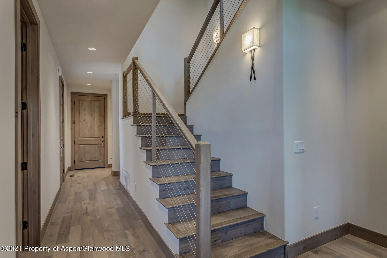 471 Boundary Lane Carbondale, CO 81623 - Photo 11 of 30 a view of entryway and hall with wooden floor