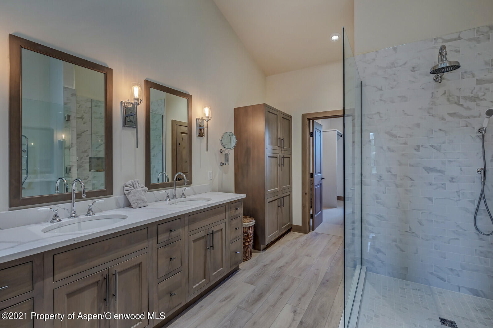 471 Boundary Lane Carbondale, CO 81623 - Photo 16 of 30 a bathroom with a double vanity sink mirror double and shower