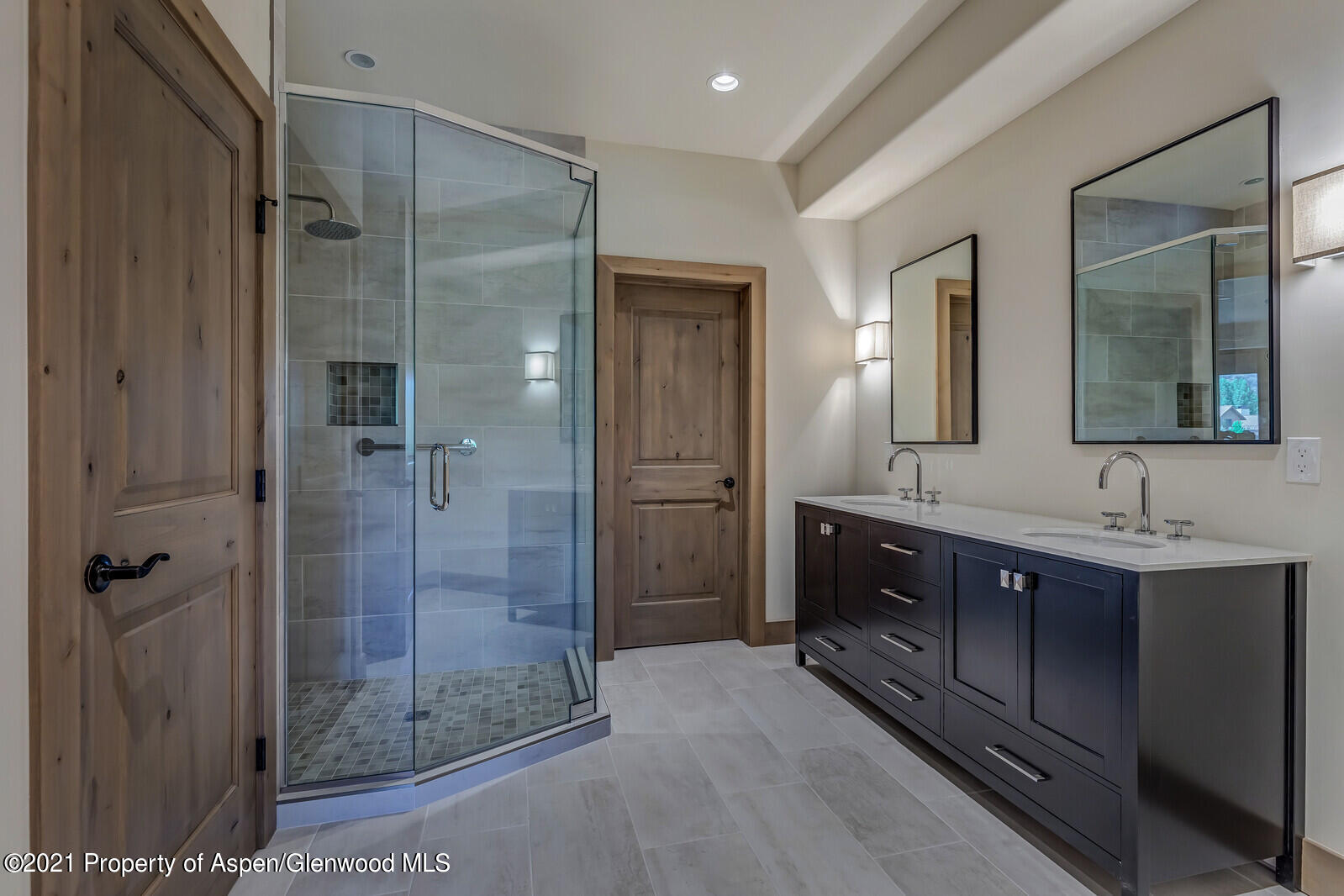471 Boundary Lane Carbondale, CO 81623 - Photo 21 of 30 a bathroom with a shower sink and mirror