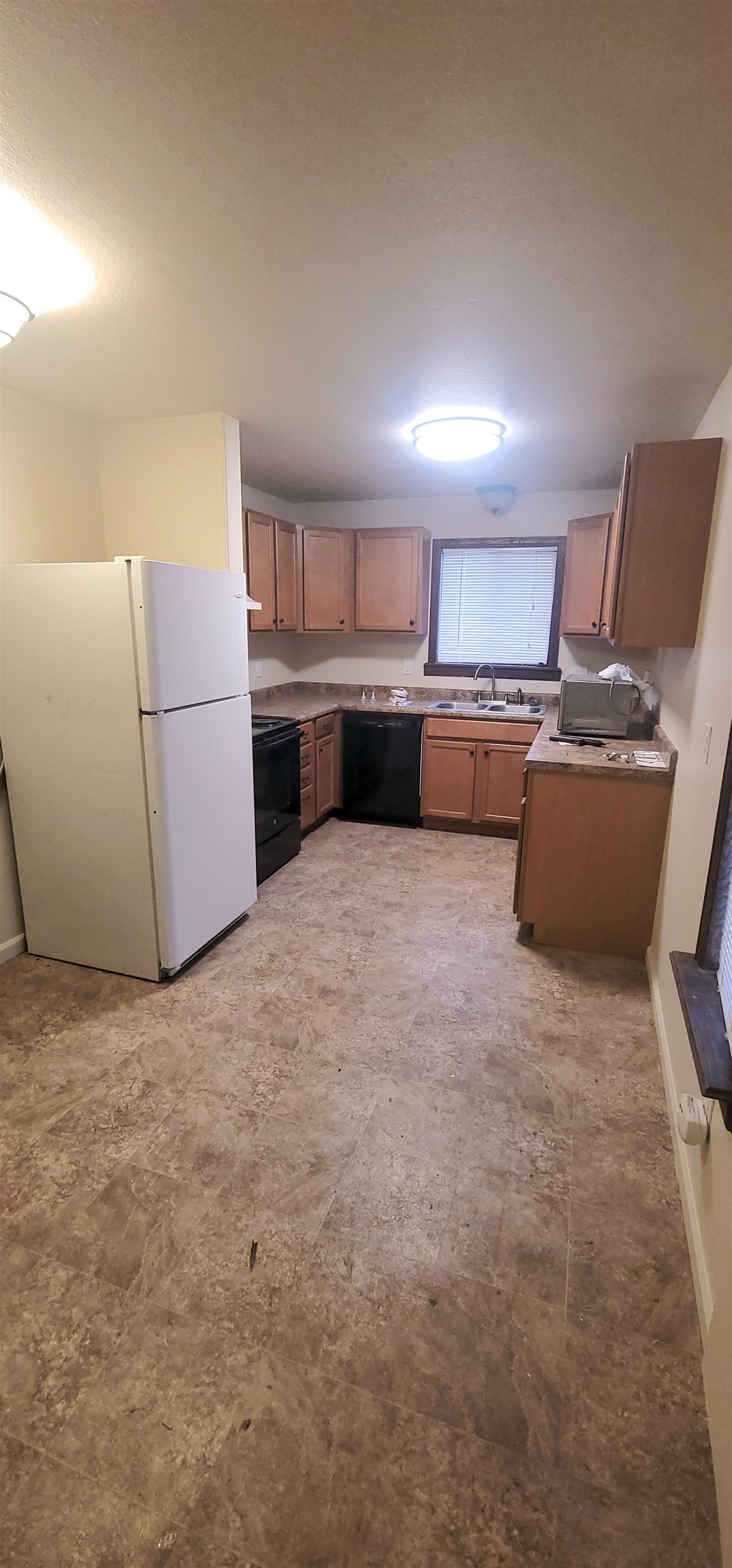 1888 K Road Fruita, CO 81521 - Photo 5 of 13 a view of a livingroom with kitchen