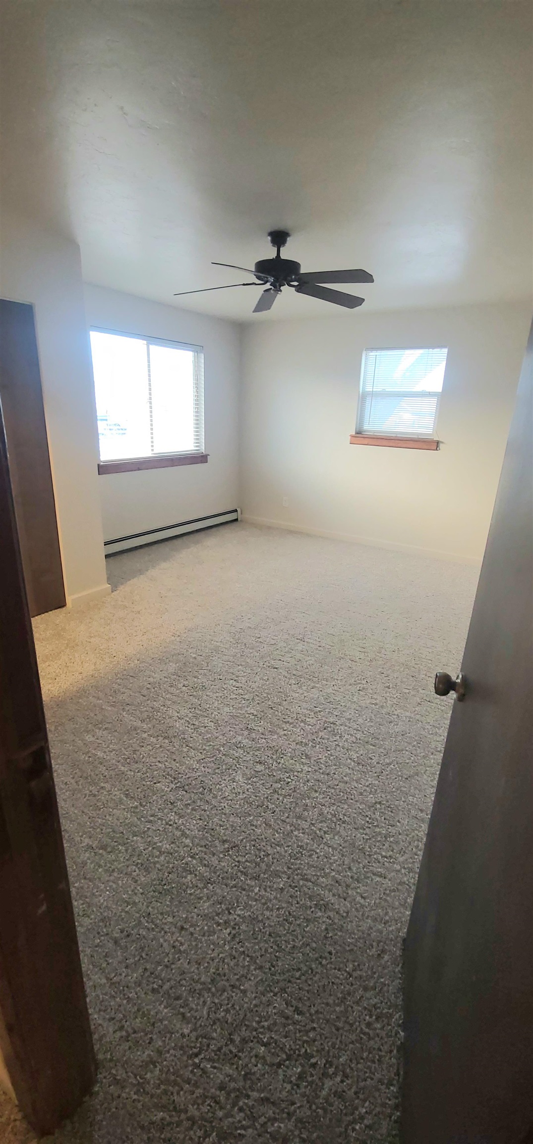 1888 K Road Fruita, CO 81521 - Photo 7 of 13 wooden floor in an empty room