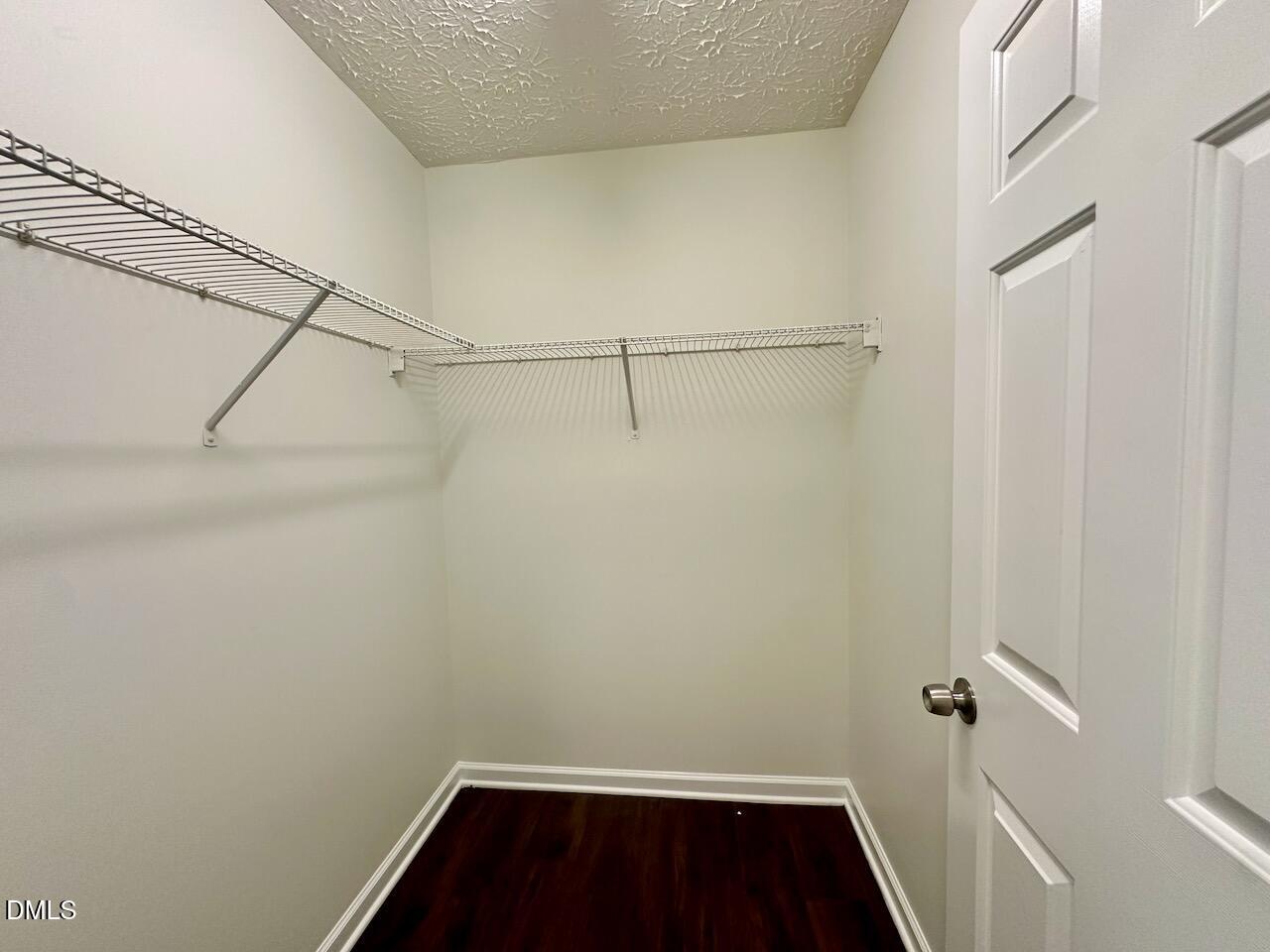 4232 Palafox Court Raleigh, NC 27604 - Photo 19 of 28 a view of small space with racks on the wall