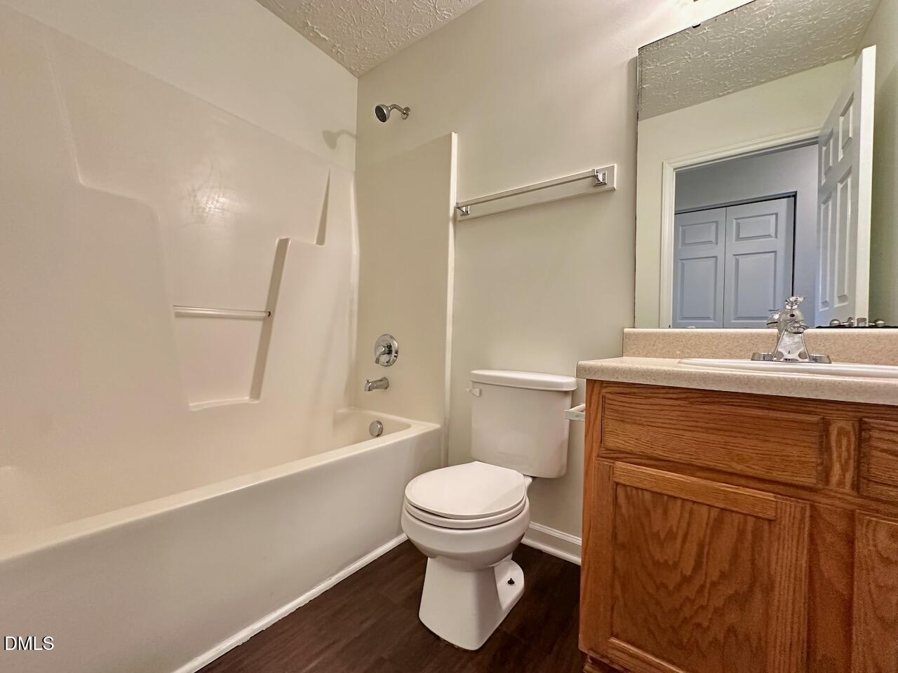 4232 Palafox Court Raleigh, NC 27604 - Photo 23 of 28 a bathroom with a sink toilet and shower