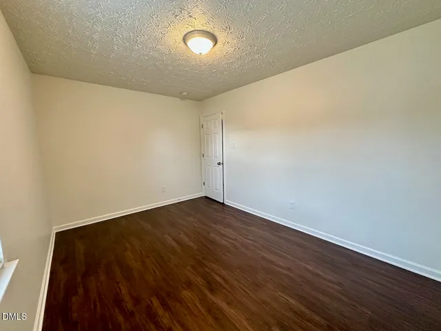 a view of small space with racks on the wall