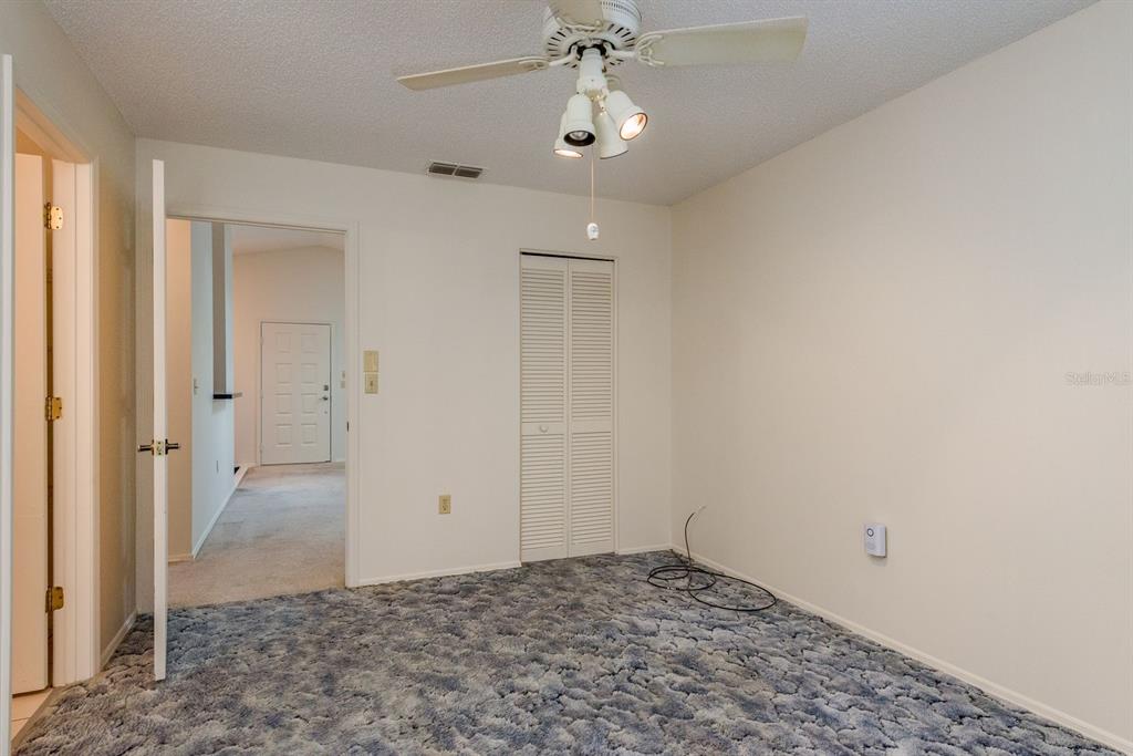 10918 Freemont Drive New Port Richey, FL 34654 - Photo 15 of 26 wooden floor in an empty room