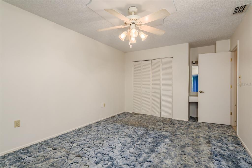 10918 Freemont Drive New Port Richey, FL 34654 - Photo 17 of 26 a view of a livingroom with a chandelier fan